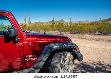 Organ Pipe NM, AZ, USA - Jan 21, 2022: A Jeep Wrangler Unlimited Sports Parked Along The Preserve Park