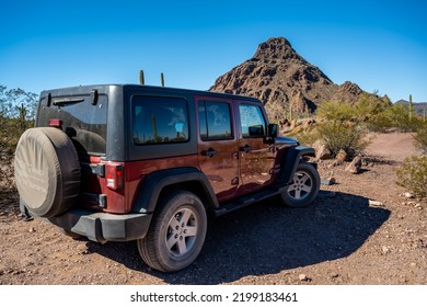 Organ Pipe NM, AZ, USA - Jan 21, 2022: A Jeep Wrangler Unlimited Sports Parked Along The Preserve Park