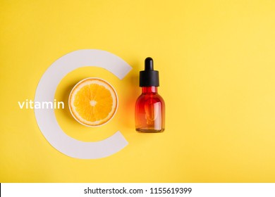 Organic bio cosmetics with vitamin C. Homeopathic oils , dietary supplements.Immunity protection concept, antiviral prevention Minimalism Flat lay - Shutterstock ID 1155619399