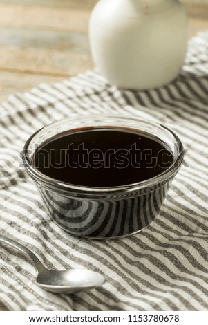 Organic Black Cane Sugar Molasses in a Bowl