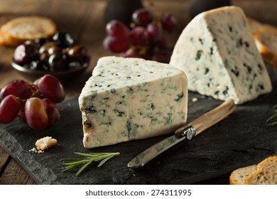 Organic Blue Cheese Wedge with Olives and Grapes