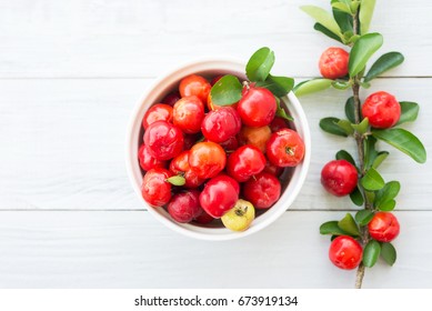 Organic Brazilian Acerola Cherry On White Wooden Table