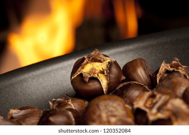 Organic Brown Chestnuts Roasting Over A Hot Fire