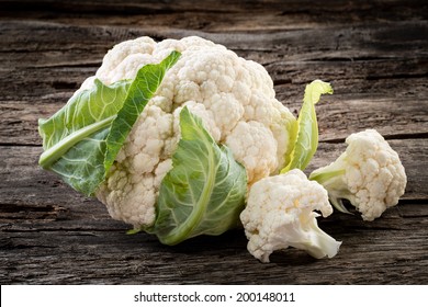 Organic cauliflower on wooden background - Powered by Shutterstock