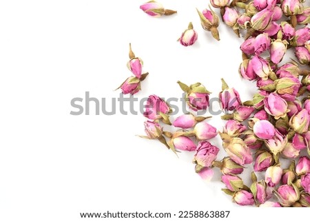 Organic Dried rose buds lifestyle images. Rose buds background photo top view. 