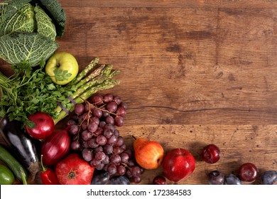 Organic foods background / studio photography of different fruits and vegetables on old wooden table  - Powered by Shutterstock