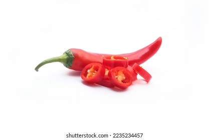 Organic fresh chili pepper with sliced isolated on white background. Ripe red hot natural chili peppers vegetable.