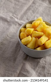 Organic Frozen Pineapple Slices In A Bowl, Side View. 