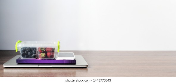 Organic Fruits In Lunch Box On Working Desk, Healthy Eating At Office, Copy Space, Banner