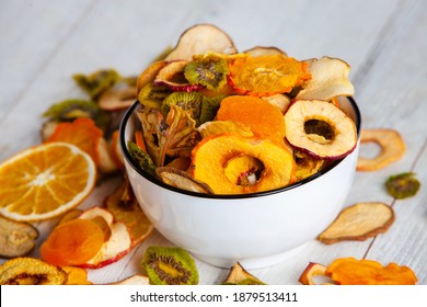 Organic Healthy Assorted Dried Fruit Mix Close Up. Dried Fruit Snacks. Dried Apples, Mango, Feijoa, Dried Apricots, Prunes Top View