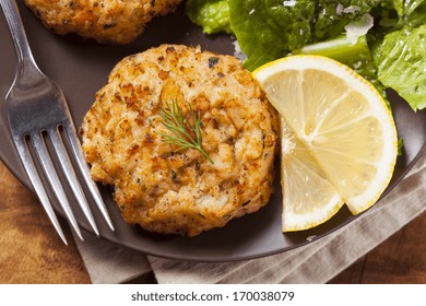 Organic Homemade Crab Cakes With Lemon And Tartar Sauce