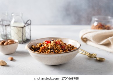 Organic Homemade Granola Cereal With Oats And Walnuts. Oatmeal Granola Or Muesli In Bowl. Side View, Copy Space For Text. Dieting