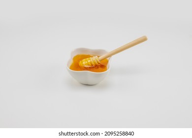 Organic Honey Shot On A White Background