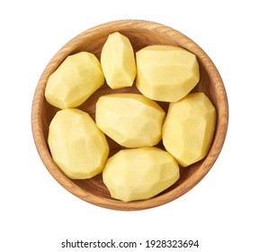 organic potatoes in wooden bowl isolated on white background.