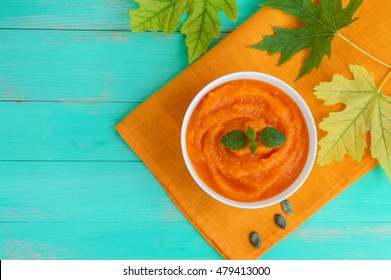 Organic Pumpkin Puree (soup) In A White Bowl. Dietary Dish. Baby Food. The Top View