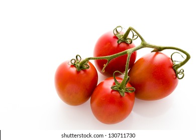 Organic Roma Tomatoes On White Background.