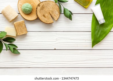 Organic Spa With Herbal Cosmetics On White Wooden Background Top View Mockup