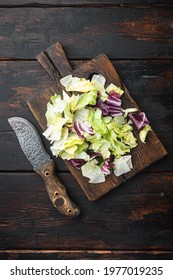 Organic Spring Mix Lettuce Set, On Wooden Cutting Board, On Old Dark  Wooden Table, Top View Flat Lay