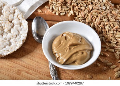 Organic Sunflower Seed Butter With Rice Cakes In A Bowl