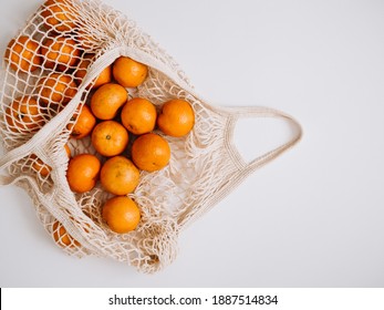 Organic Tangerines In An Eco Bag Are Not Ideal Fruits. Ugly Tangerines And Fruits.