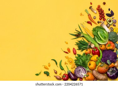 Organic vegetables background. Photo of different vegetables on yellow background. Copy space. Top view. High resolution product - Powered by Shutterstock