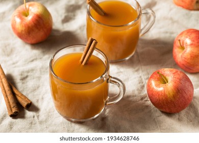 Organic Warm Refreshing Apple Cider Juice with a Cinnamon Stick
