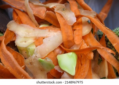 Organic Waste With Carrot Peel And Potato Peel, Vegetable Scraps Being Thrown In The Trash, Food Peelings Being Thrown Away