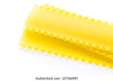 Organic Yellow Lasagne Pasta On A White Background.