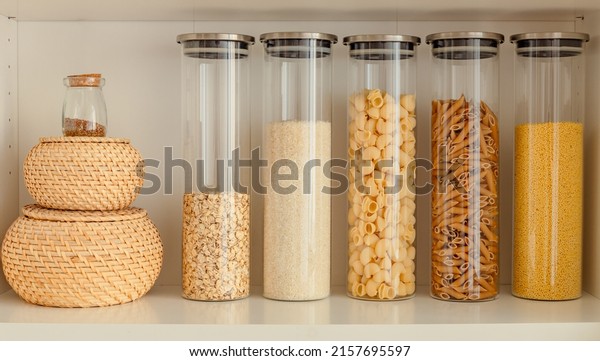 organization of food\
storage in the kitchen, transparent reusable jars for cereals and\
pasta, zero waste\
pantry