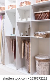 Organization of Home Space and Comfort of the Interior and Storage of Things on the Shelves in the Closet in Wicker Straw Baskets and Containers