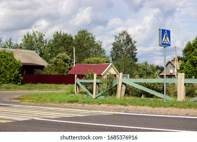 Organization Of Pedestrian Traffic Across The Road On Country Roads. Rural Unregulated Pedestrian Crossing Over A Two-lane Road. Traffic Safety In Villages.