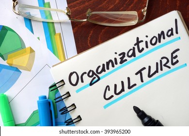 Organizational Culture written in a notepad. Business concept.