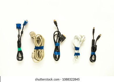 Organized Computer Cables, Electronic Wires And Rechargers, Conveniently Folded With Insulating Tape. Pedantic Order Concept, Flat Lay, View From Above