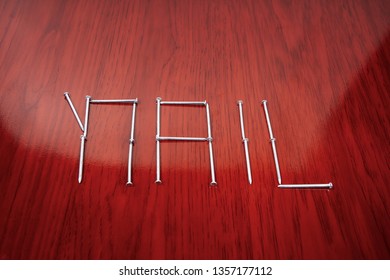 An Organized Group Of Nails Forming The Word Nail