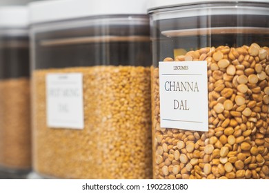 Organized, Labeled Food Pantry In Kitchen With Spices, Grains, Flours, And Rice