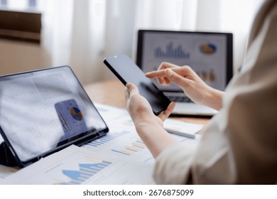 Organized stack of business documents and paperwork on office desk, representing planning, financial analysis, management, efficiency, responsibility, and deadline-focused professionalism.