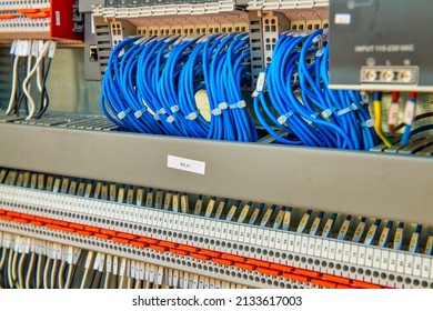 Organized Tidy And Not Messy Electronic Signal Processing Wires In A Science Lab. Many Connected Cables In Sockets