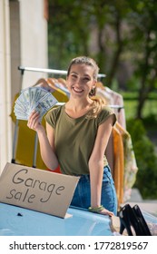 Organizing Sales. Joyful Positive Woman Feeling Happy While Having Her Small Successful Business