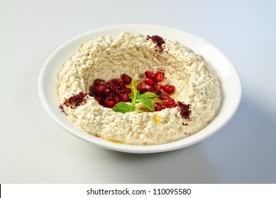 Oriental Arabic Food Hummus With Pomegranate Seeds.