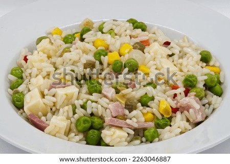 Oriental cantonese rice in a white plate isolated on white background