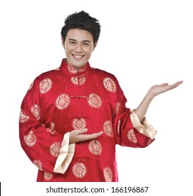 Oriental Chinese Young Man With Tradition Clothing With His Hands Into The Air