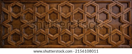 Oriental pattern, geometric decoration  on wooden background