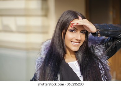 Oriental style. Sensual arabic woman model. Beautiful young girl in fur coat