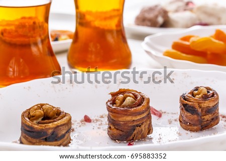 Similar – Image, Stock Photo Assorted gourmet pastries with fresh fruit toppings