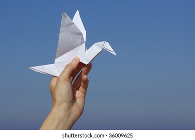 Origami Bird On A Hand