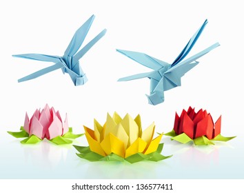 origami blue dragonfly over flowers lotus over white background