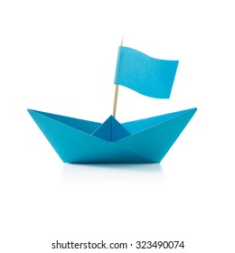 Origami Blue Paper Boat With Flag On White Background