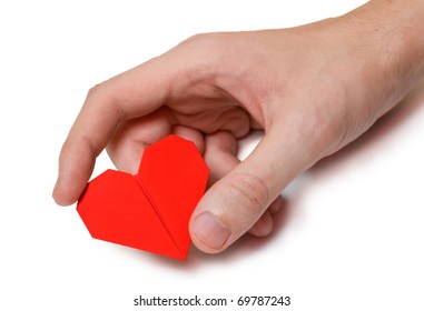 Origami Heart In Hand, Isolated On White With Path