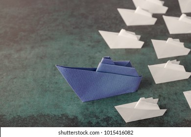 Origami Paper Ship Boats, Success Leadership, Strategy Planning Development, Social Media Influence Marketing, HR Recruiter, Disruptive Innovation, Breakthrough Business Model Solutions Concept