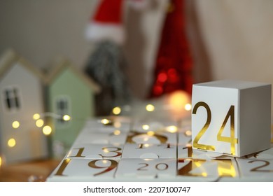Original advent calendar with gold numbers from 1 to 24, New Year crafts, gift boxes for every day, magical moments, Christmas miracle in every home, gifts for Christmas, Soft focus, depth of field - Shutterstock ID 2207100747